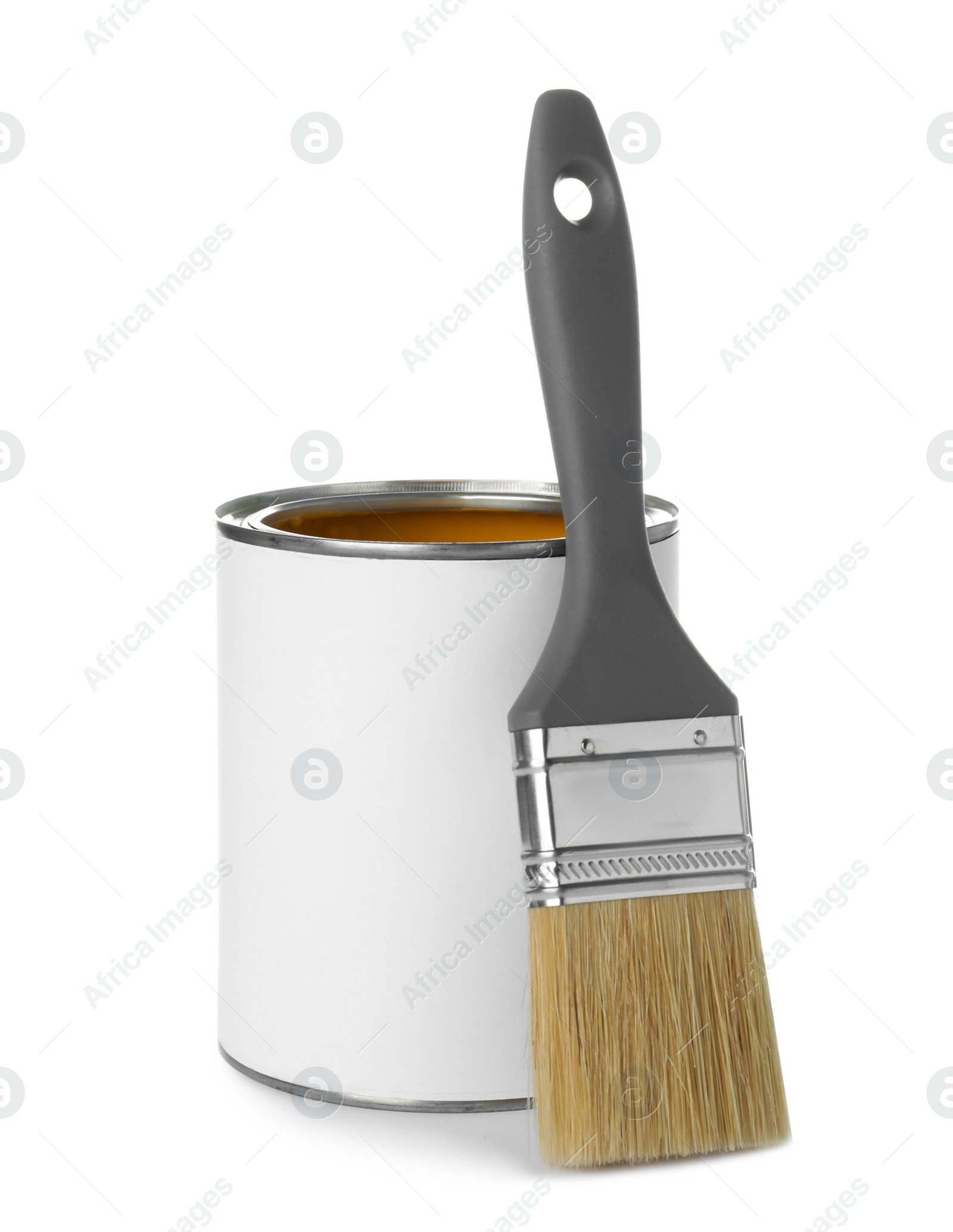 Photo of Paint can and brush on white background