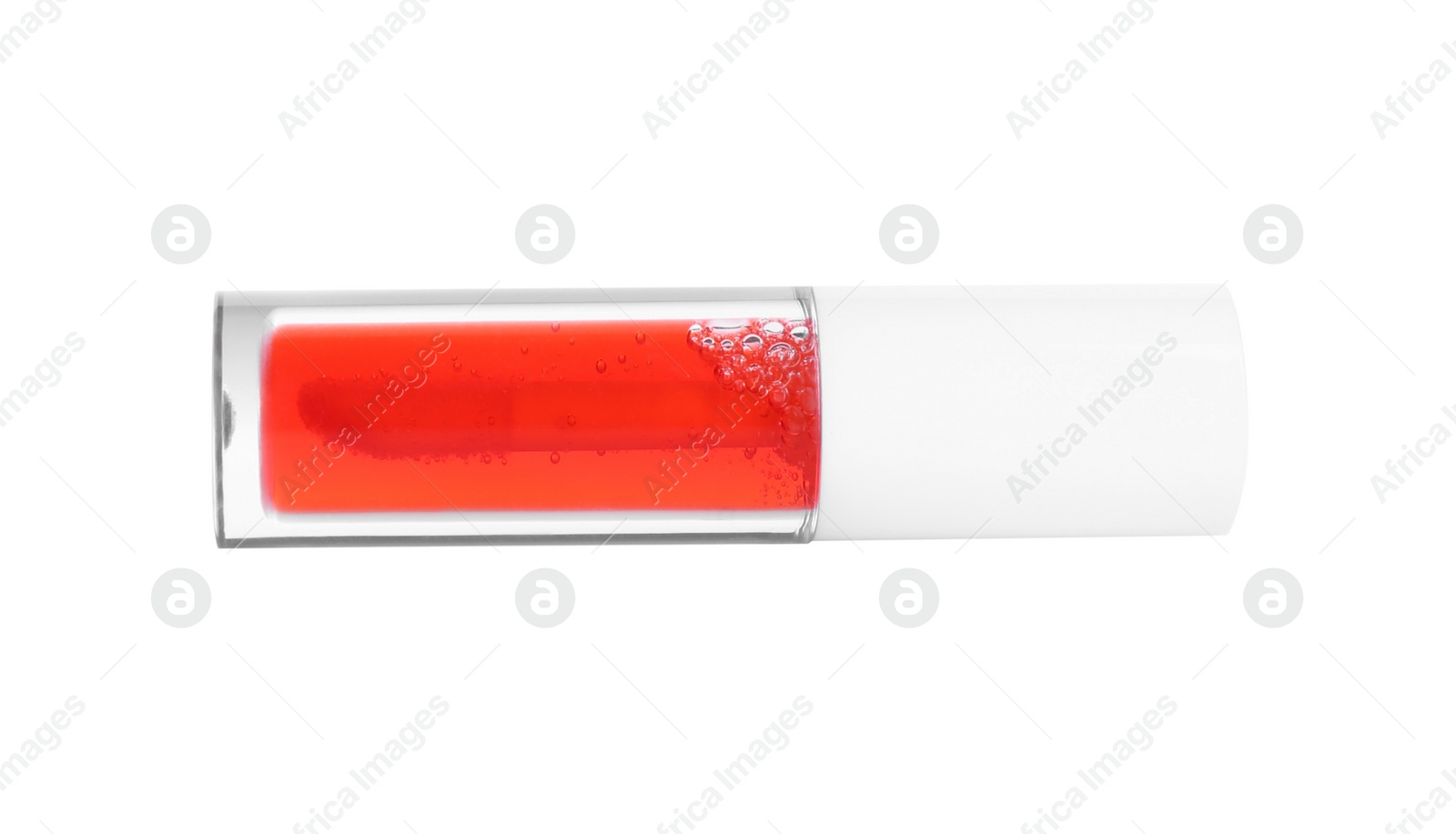 Photo of One red lip gloss isolated on white. Cosmetic product