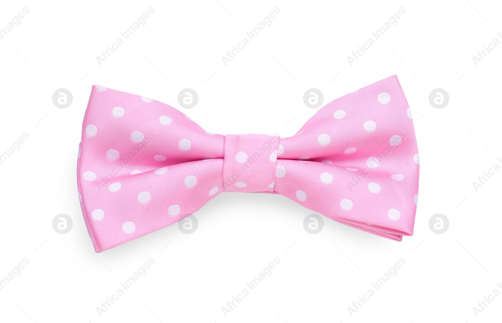 Photo of Stylish pink bow tie with polka dot pattern on white background, top view