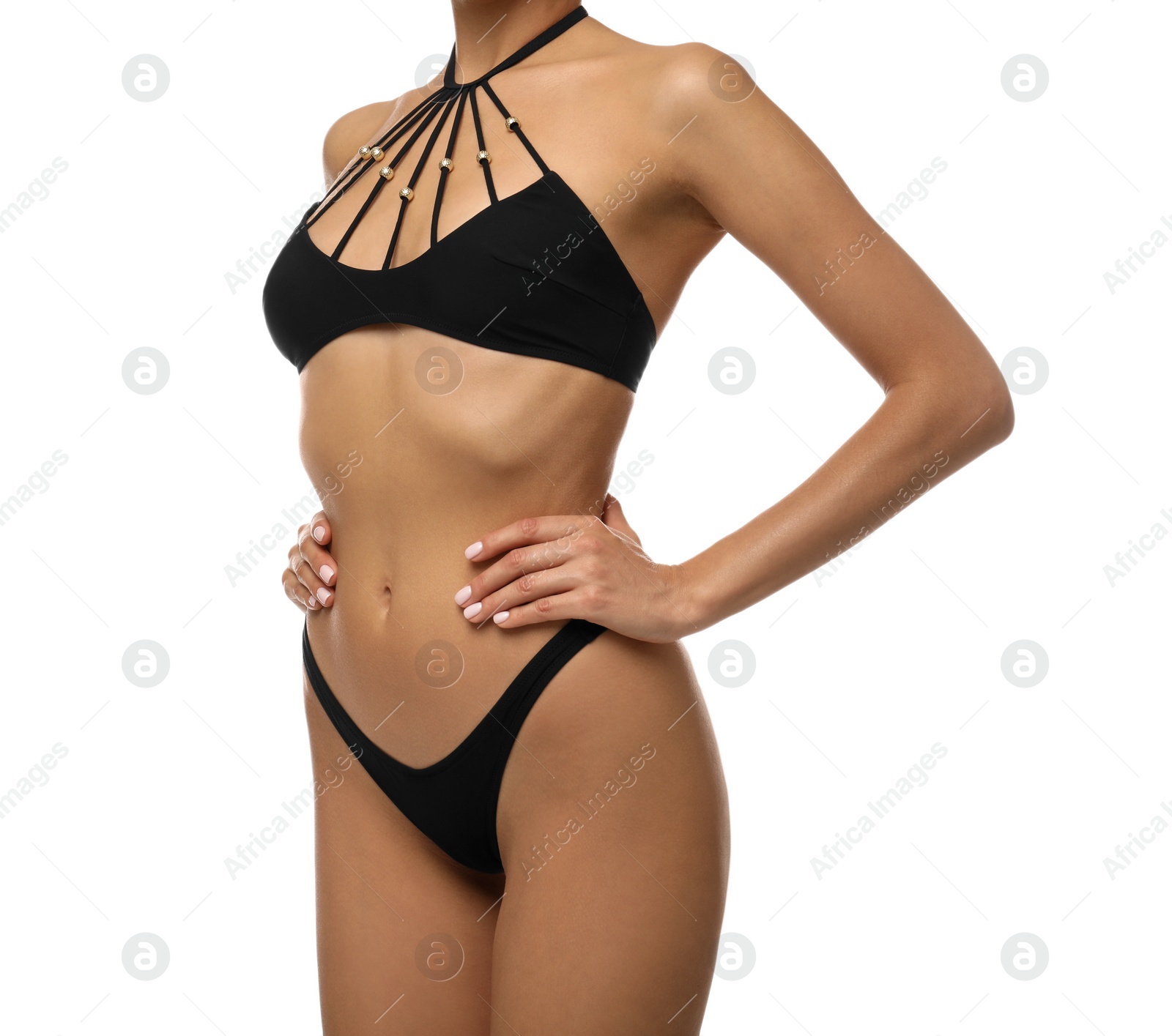 Photo of Sexy young woman in stylish swimsuit isolated on white, closeup. Beach body goal