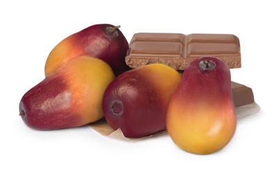 Fresh ripe palm oil fruits and chocolate on white background