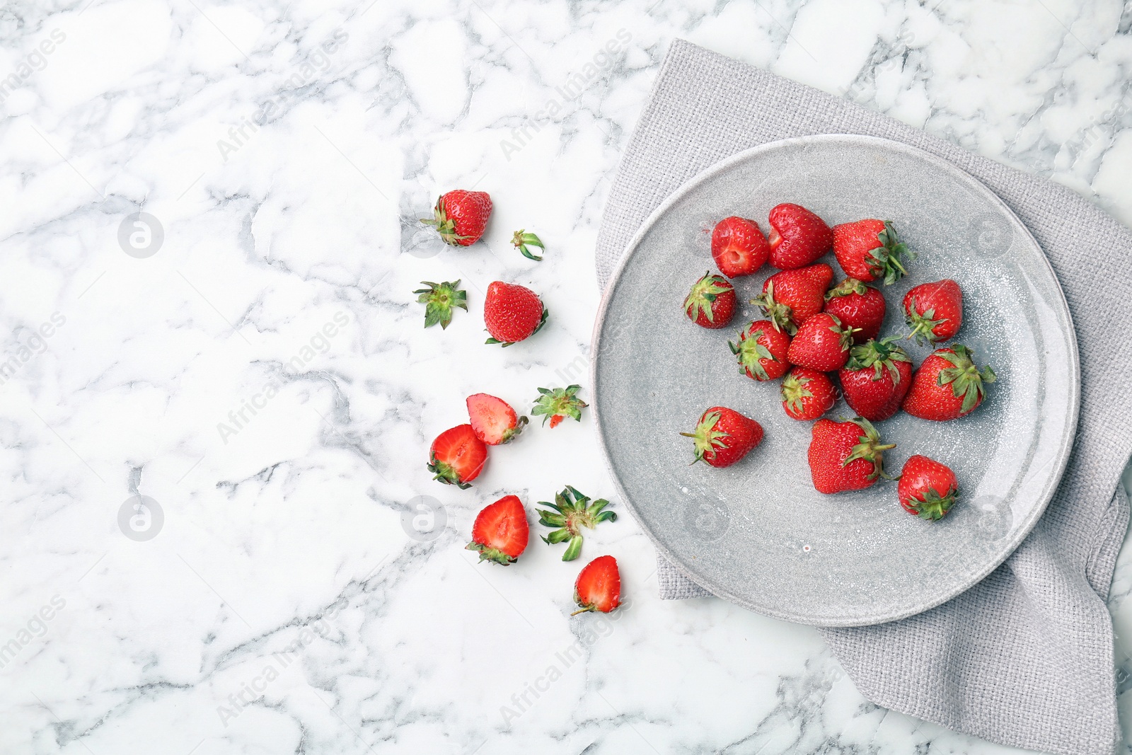 Photo of Flat lay composition with ripe red strawberries on marble background