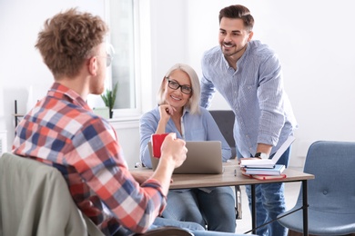 Business people interviewing candidate in office. Professional communication