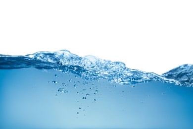 Photo of Splash of clear blue water on white background