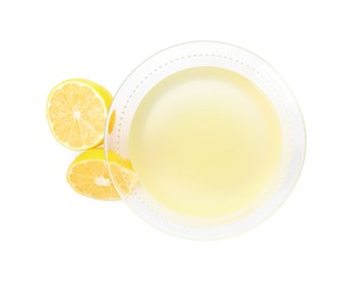 Freshly squeezed lemon juice on white background, top view