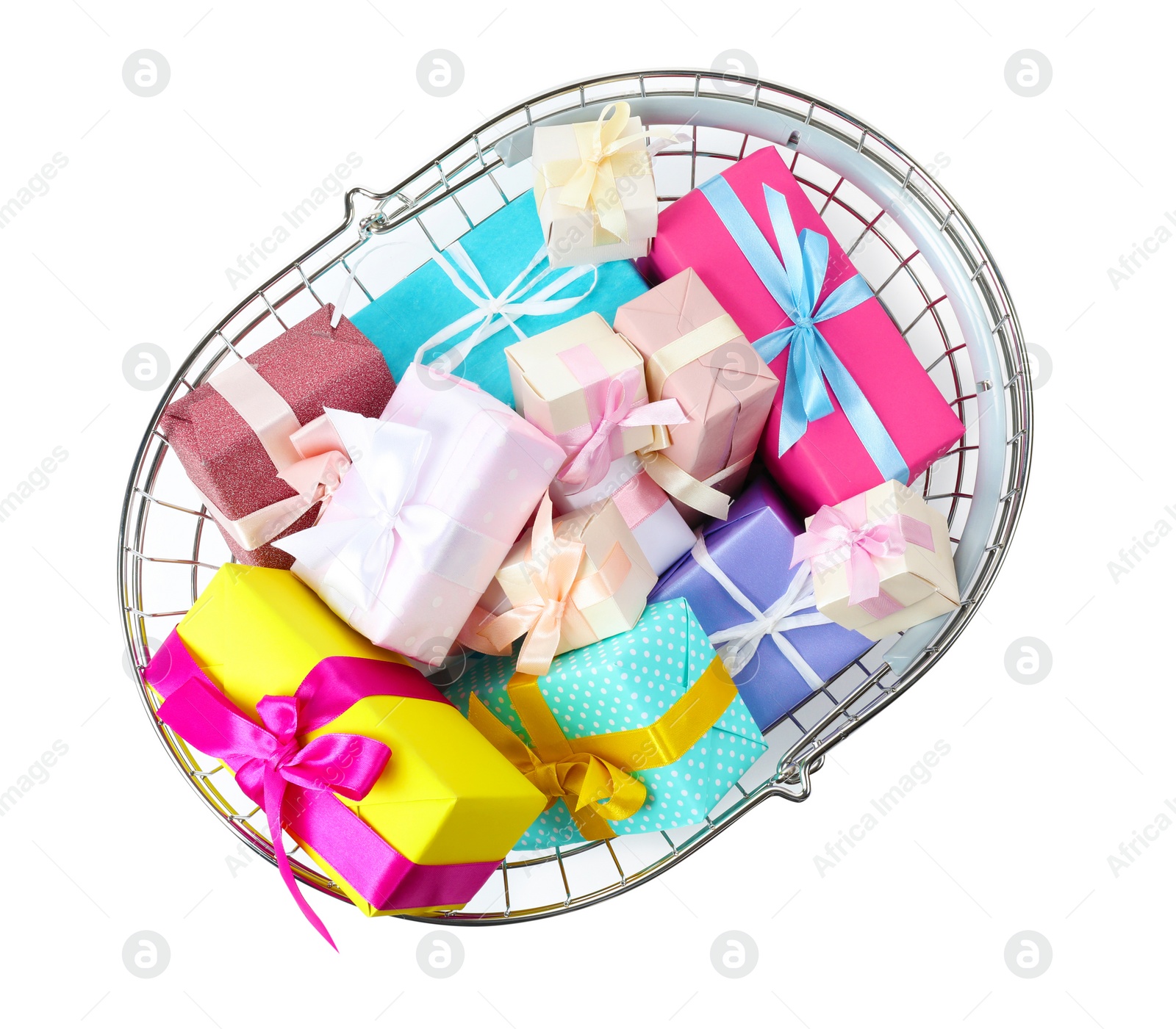 Photo of Shopping basket full of gift boxes on white background, top view