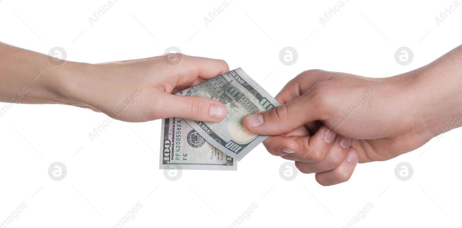 Photo of Money exchange. Man giving dollar banknote to woman on white background, closeup