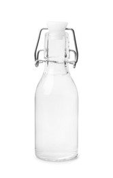 Photo of Vinegar in glass bottle isolated on white