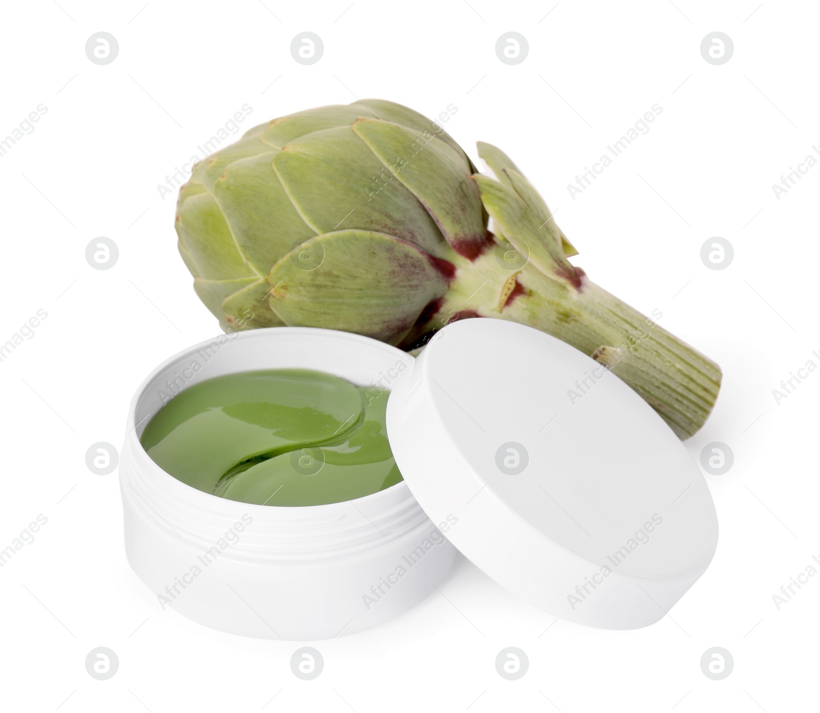 Photo of Package of under eye patches and artichokes on white background. Cosmetic product