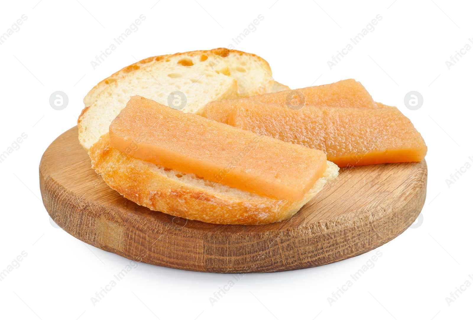 Photo of Delicious sweet quince paste and bread isolated on white