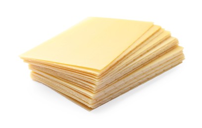 Photo of Stack of uncooked lasagna sheets isolated on white