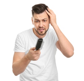 Young man with hair loss problem on white background