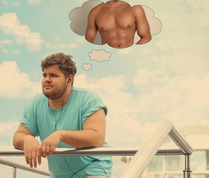 Image of Overweight man dreaming about muscular body outdoors. Weight loss concept