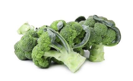 Photo of Pile of fresh raw green broccoli isolated on white