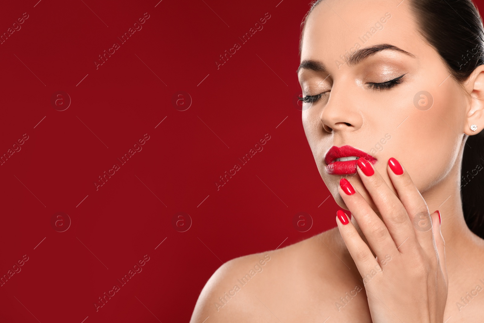 Photo of Beautiful young woman with bright manicure on color background, space for text. Nail polish trends