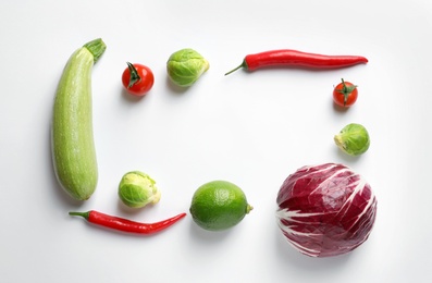 Photo of Fresh vegetables and fruit on white background, top view