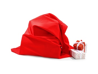 Photo of Santa Claus red bag full of presents on white background