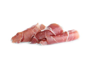 Slices of tasty prosciutto on white background