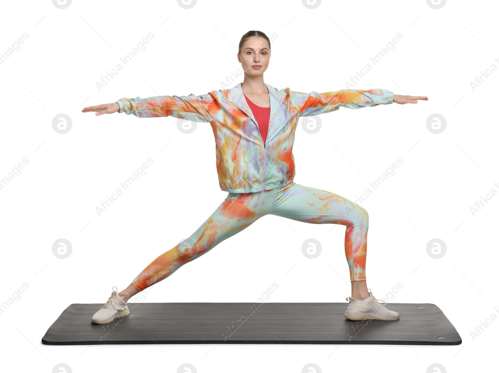 Photo of Young woman practicing yoga on white background