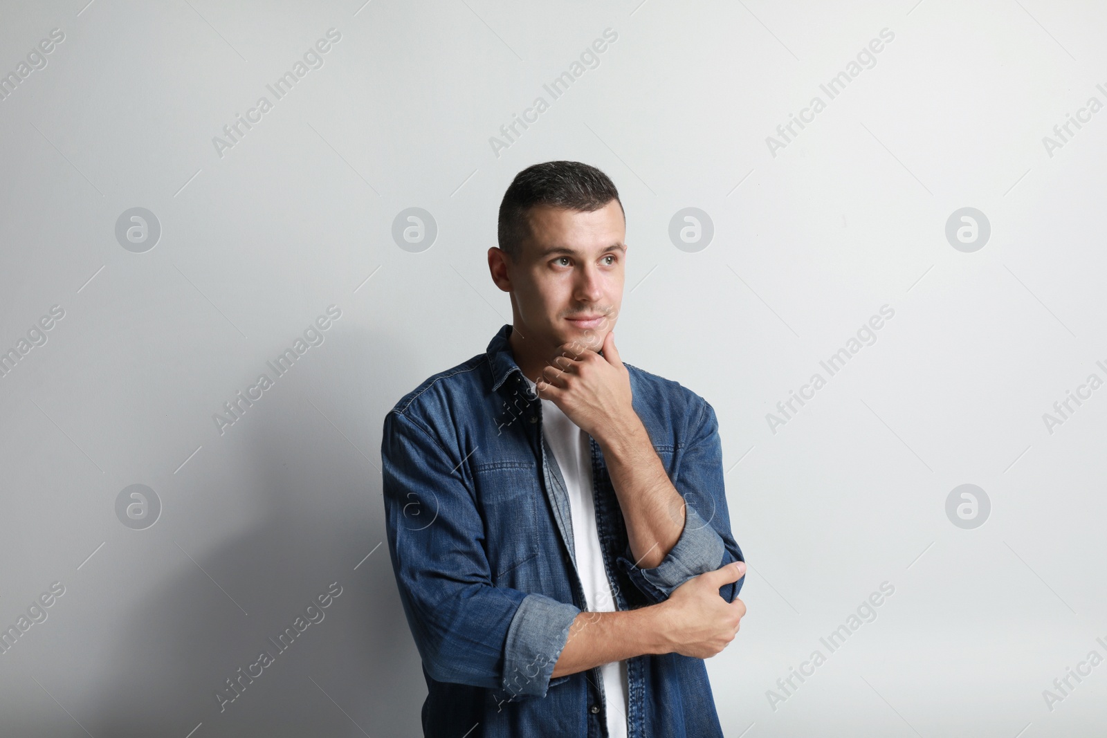 Photo of Portrait of handsome man on white background