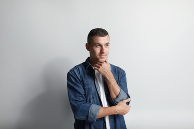 Photo of Portrait of handsome man on white background