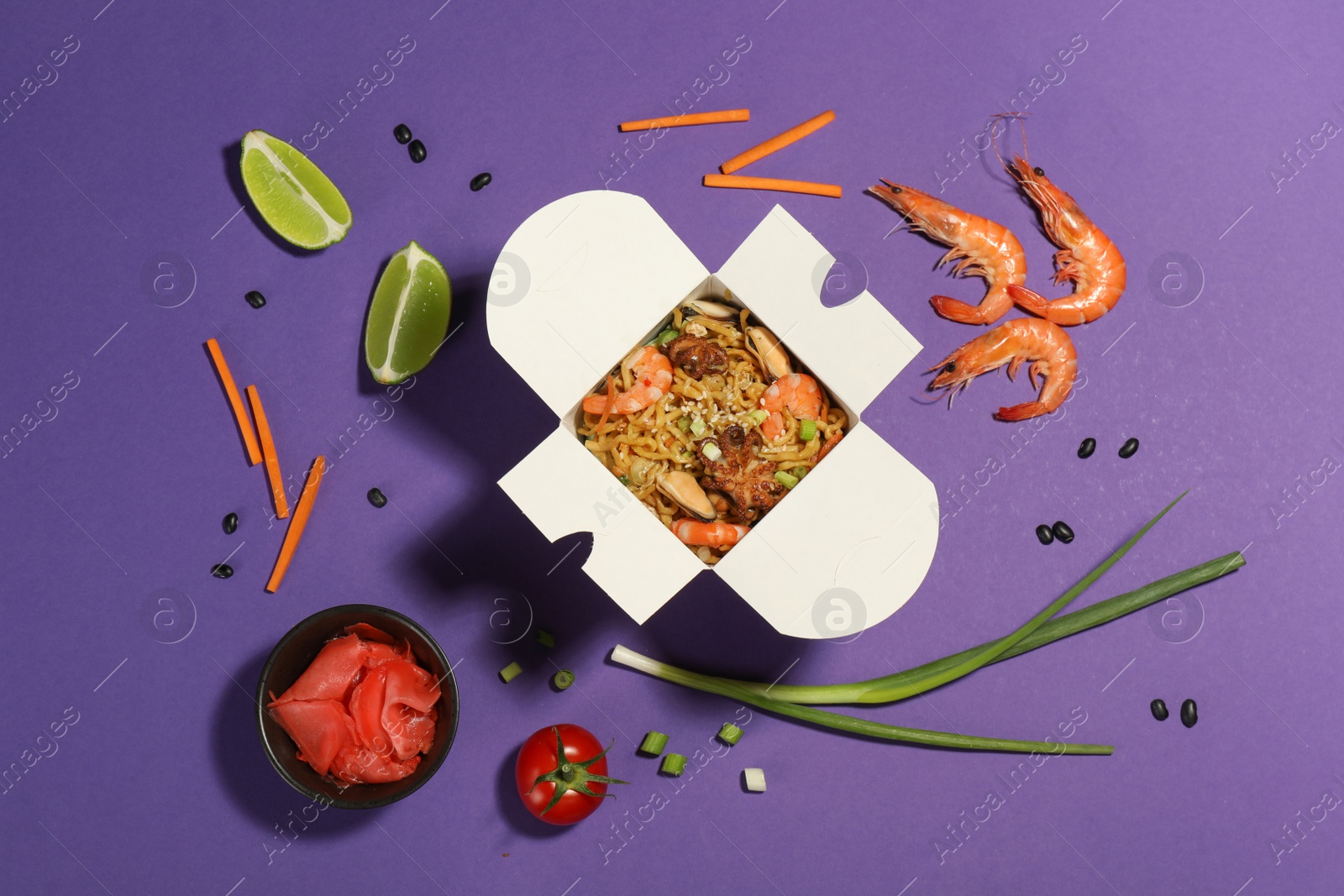 Photo of Flat lay composition with noodle wok and ingredients on purple background