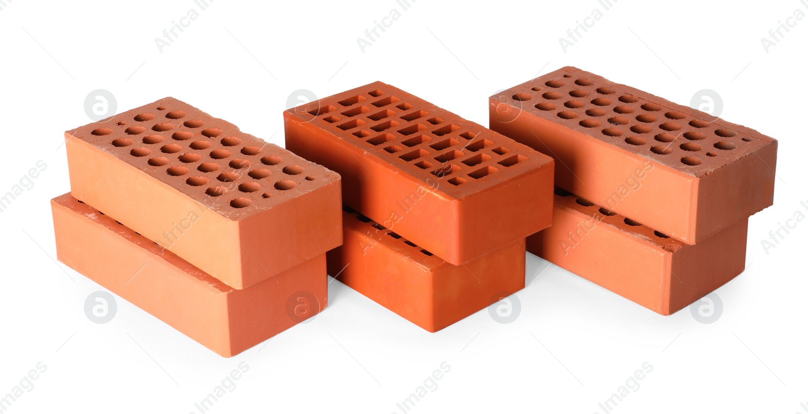 Photo of Many red bricks on white background. Building material