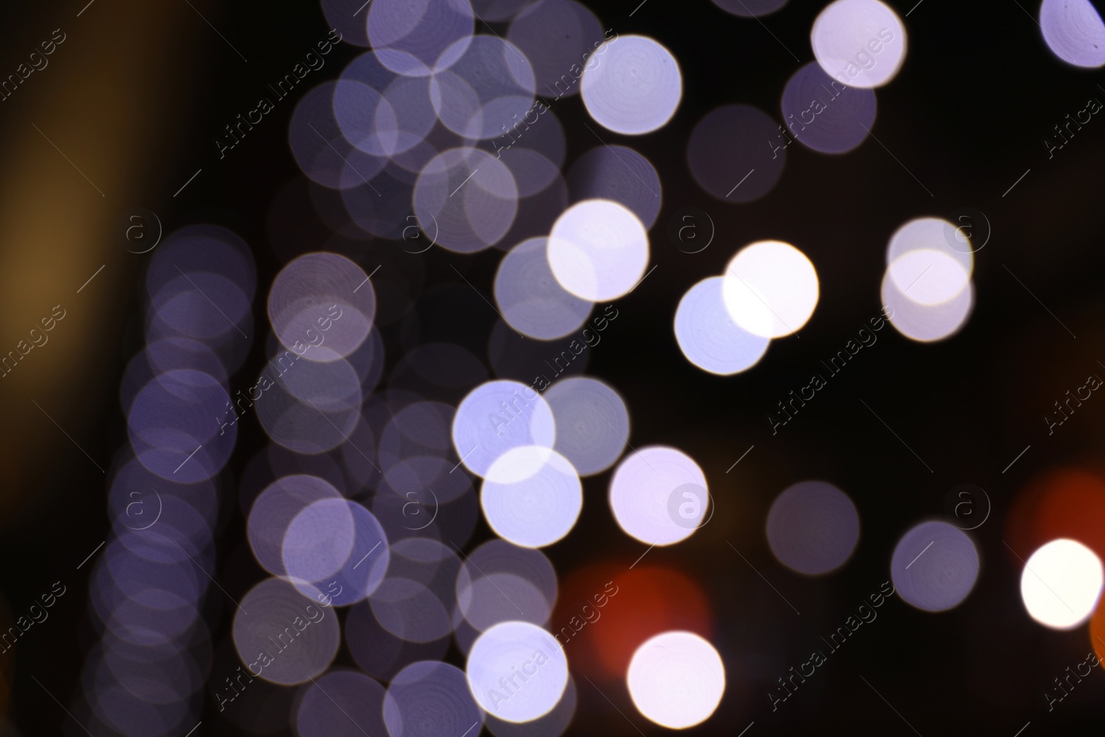 Photo of Beautiful street lights at night. Bokeh effect