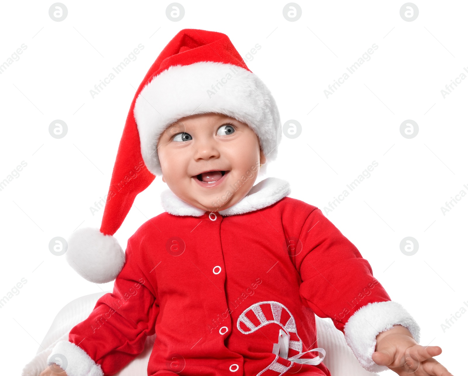 Photo of Cute baby in Christmas costume on white background