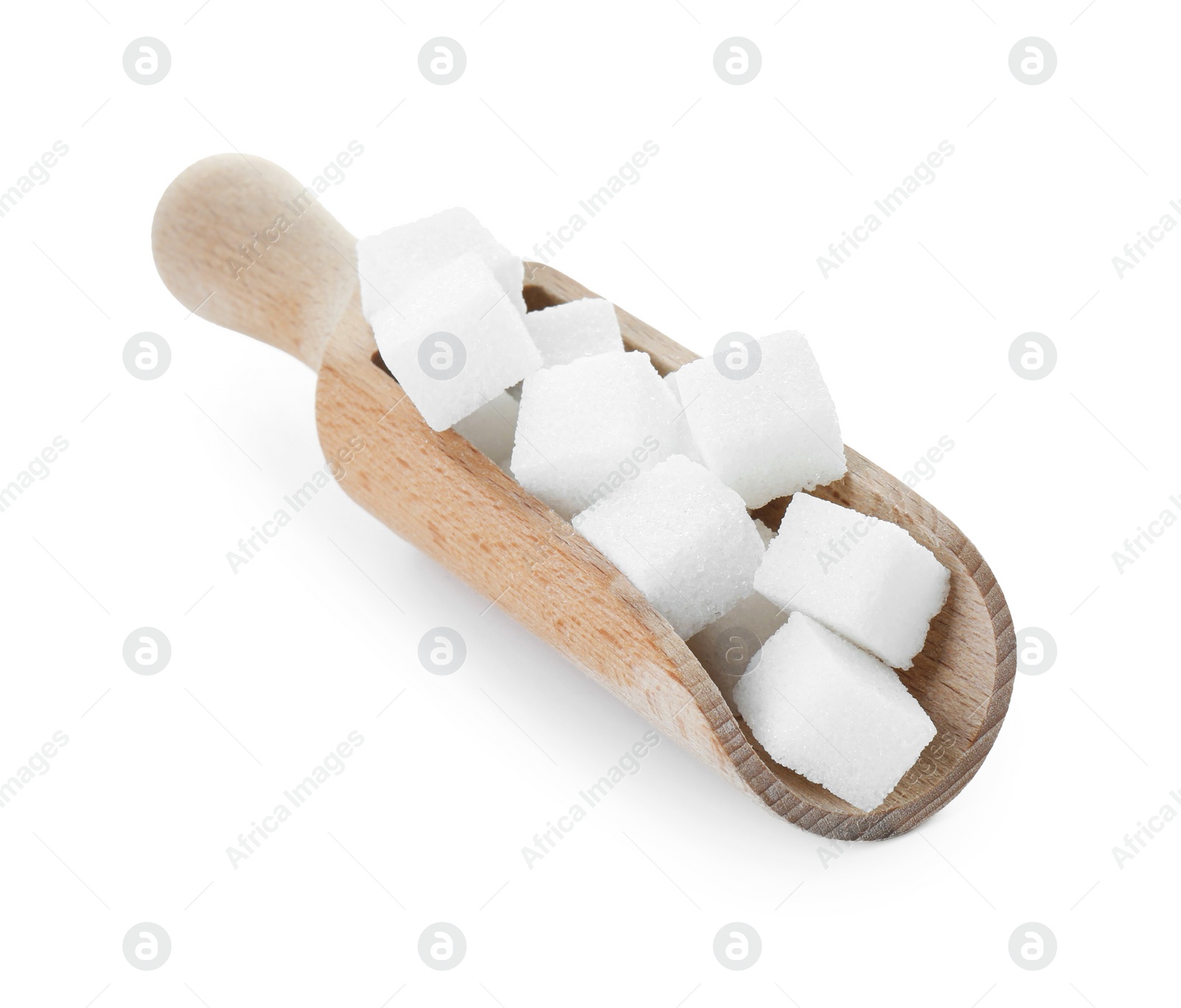 Photo of Sugar cubes in wooden scoop isolated on white