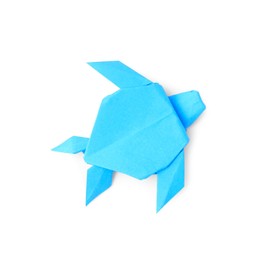 Photo of Origami art. Handmade light blue paper turtle on white background, top view