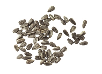 Photo of Raw sunflower seeds on white background, top view