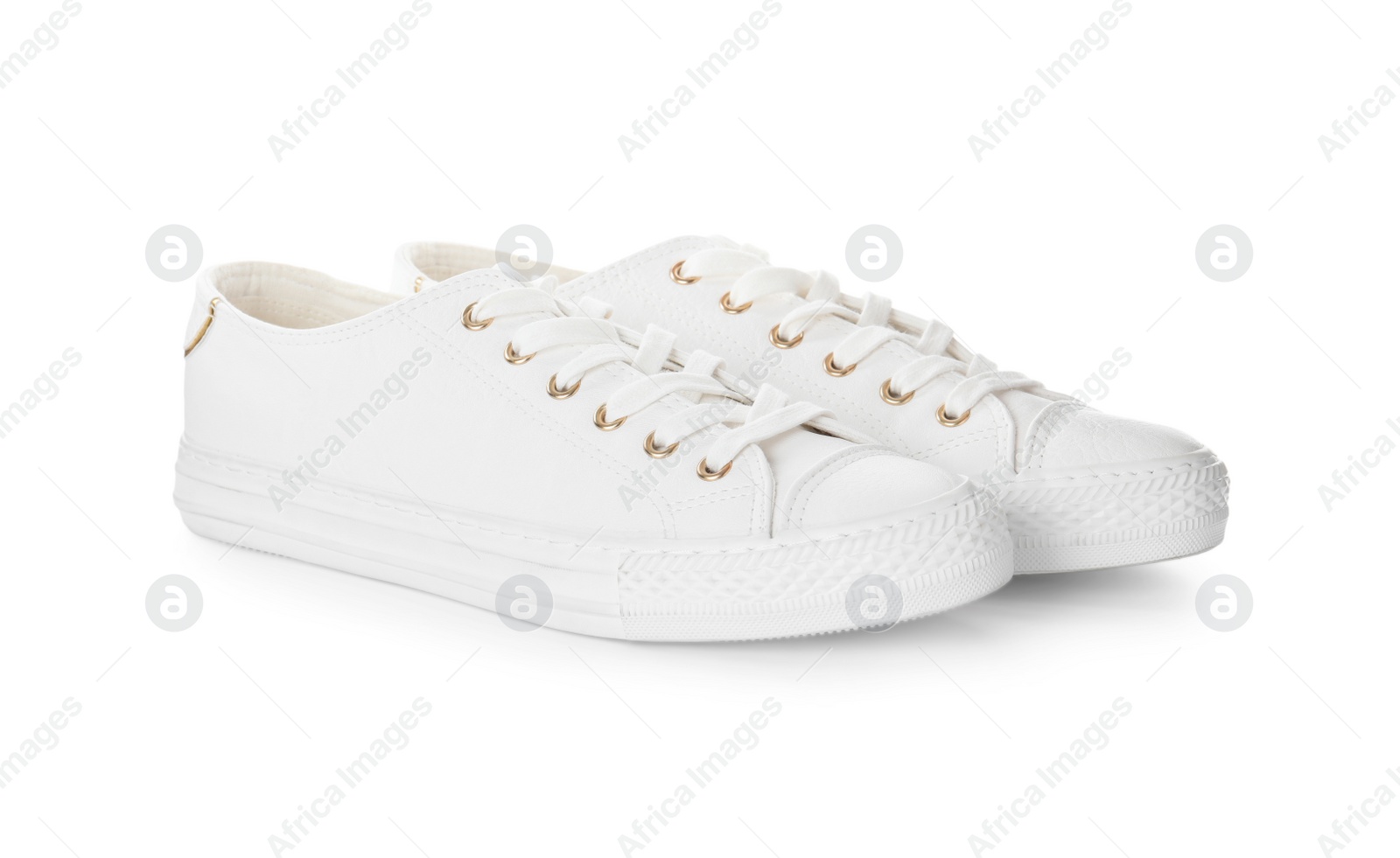 Photo of Pair of stylish sneakers on white background