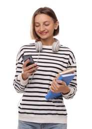 Photo of Young student with books and headphones using smartphone on white background
