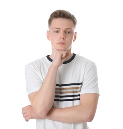 Photo of Portrait of thoughtful teenage boy on white background