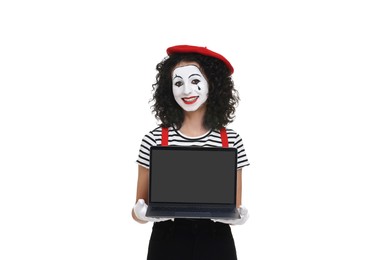 Photo of Funny mime with laptop posing on white background