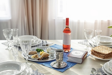 Photo of Table served for Passover (Pesach) Seder indoors