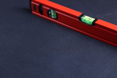 Photo of Building level on dark background. Space for text
