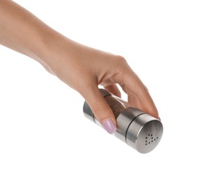 Photo of Woman holding pepper shaker on white background, closeup