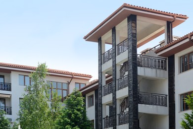 Photo of Exterior of beautiful building with staircase and balconies