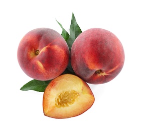 Photo of Sweet juicy peaches with leaves on white background, top view