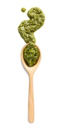 Photo of Sample of tasty pesto sauce and spoon isolated on white, top view