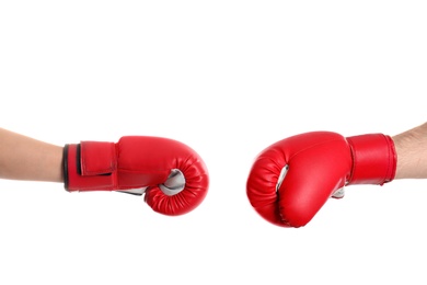 Photo of Men in boxing gloves on white background, closeup