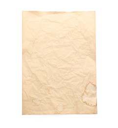 Photo of Sheet of old parchment paper isolated on white, top view. Space for design