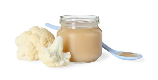 Photo of Tasty baby food in jar, spoon and fresh cauliflower isolated on white