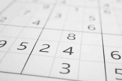 Photo of Sudoku puzzle grid as background, closeup view