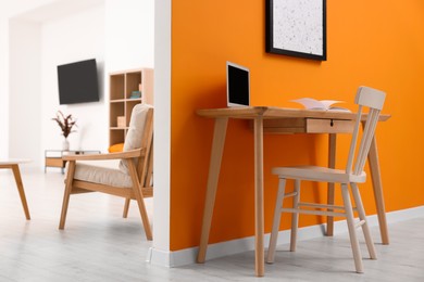 Photo of Wooden furniture in beautiful room. Interior design