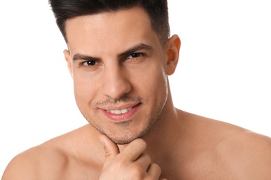Photo of Handsome man with stubble before shaving on white background, closeup