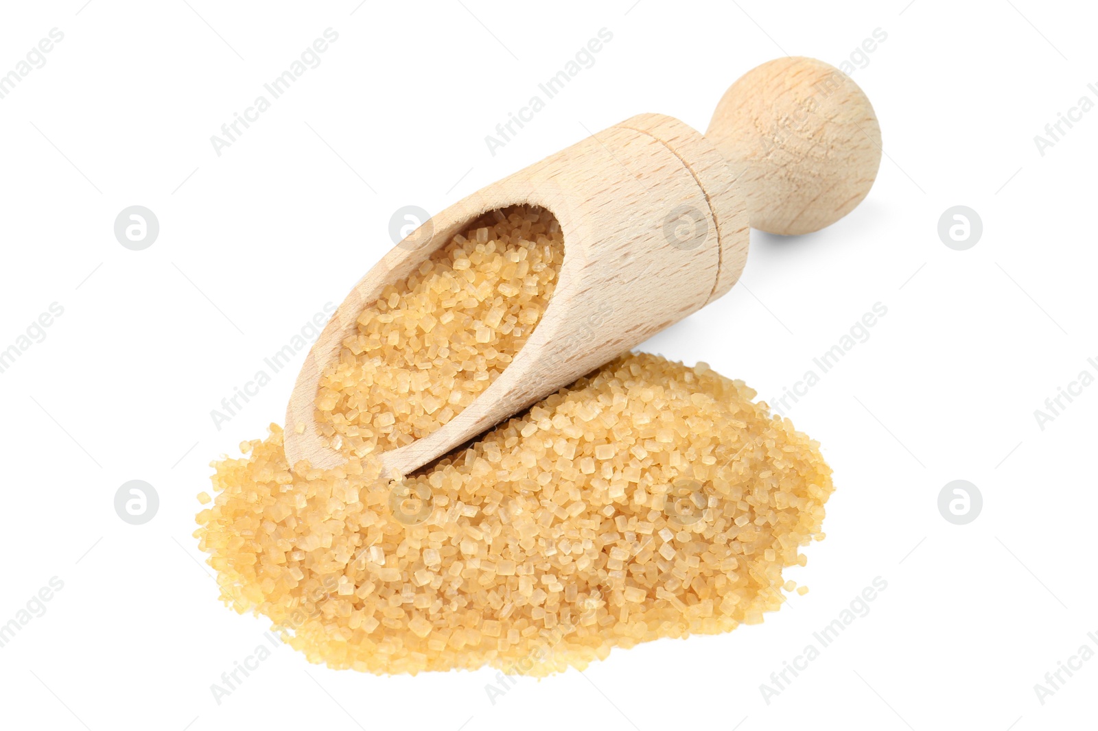 Photo of Pile of brown sugar and wooden scoop isolated on white