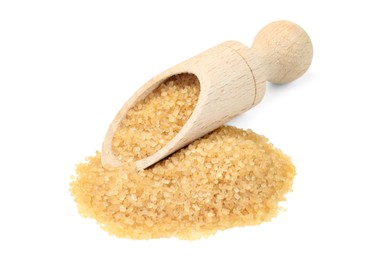 Photo of Pile of brown sugar and wooden scoop isolated on white